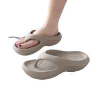 Beige platform flip-flops.