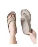 Beige platform flip-flops.