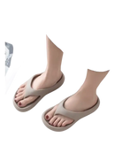 Beige platform flip-flops.
