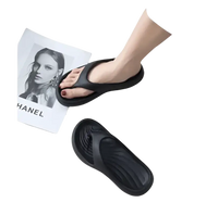 Black platform flip-flops.