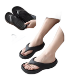 Black platform flip-flops.