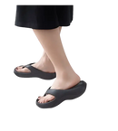 Black platform flip-flops.