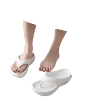 White platform flip-flops.