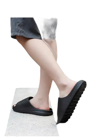 Black slip-on sandals.