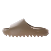 Beige slide sandal.