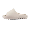 Beige slip-on sandal.