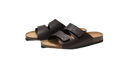 Brown leather double-strap sandals.