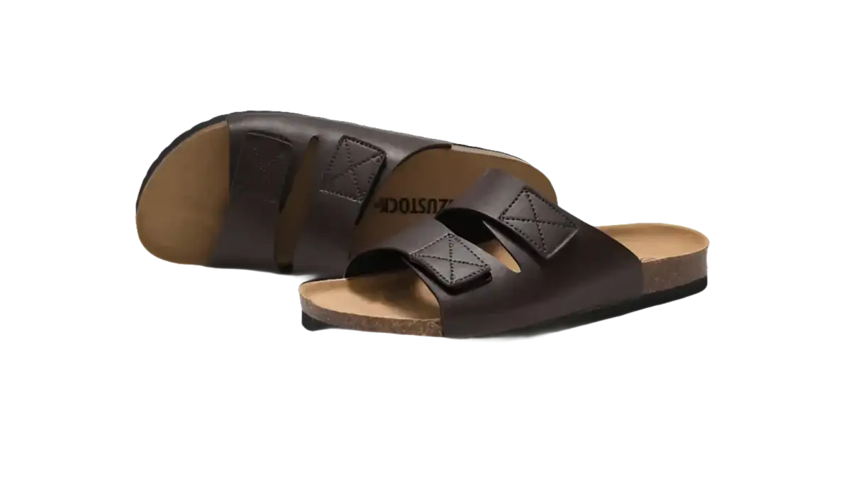 Brown leather sandals with cork soles.