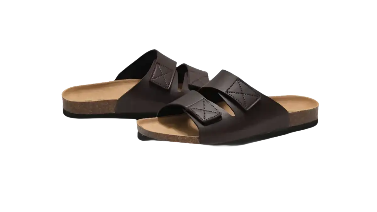 Brown leather slide sandals.