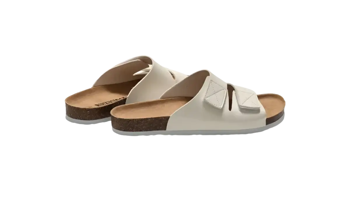 White leather slide sandals.