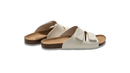 White leather slide sandals.