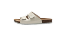 White, two-strap slide sandal.