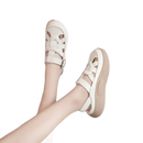 Beige leather platform sandals.