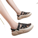 Platform sandal with black straps.