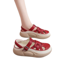 Red leather woven platform sandals.