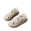 White leather platform sandals.