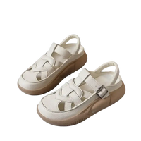White leather platform sandals.