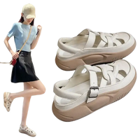 White leather platform sandals.