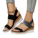 Black elastic wedge sandals.