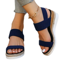 Navy blue elastic platform sandals.