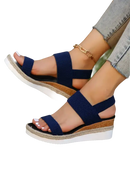 Navy blue elastic wedge sandals.