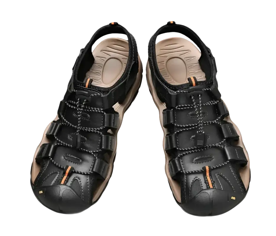Black leather fisherman sandals.