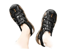 Black leather fisherman sandals.
