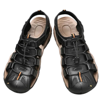Black leather fisherman sandals.