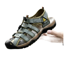 Gray leather sandal with adjustable straps.