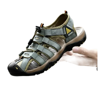 Gray leather sandal with adjustable straps.