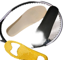 Shoe insoles on a tennis racket.