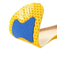 Yellow honeycomb insole with blue cushioning.