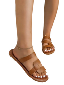Brown leather sandals.