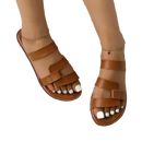 Brown leather strappy sandals.