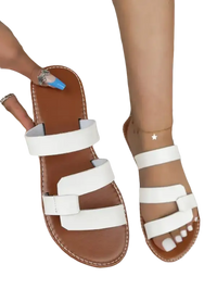 Brown and white leather sandals.