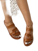 Brown leather strappy sandals.