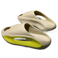 Beige and yellow slide sandals.