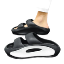 Black platform slide sandals.