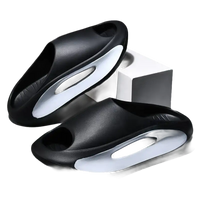 Black and white cushioned slides.