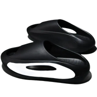 Black and white cushioned slides.