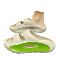 Beige double-strap platform slides.