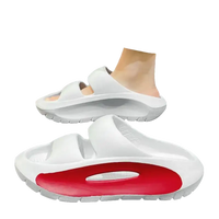 White platform slide sandals.