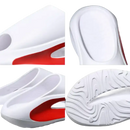 White and red slip-on sandals.
