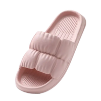 Pink puffy slide sandal.