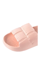 Pink cushioned slide sandal.