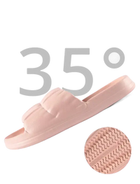 Pink slide sandal with grooved sole.