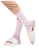 Pink and white checkered socks with white slide sandals.