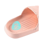 Pink EVA slipper with textured insole.