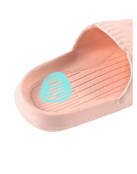 Pink EVA slipper with textured insole.