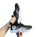 Black athletic shoes with white soles.